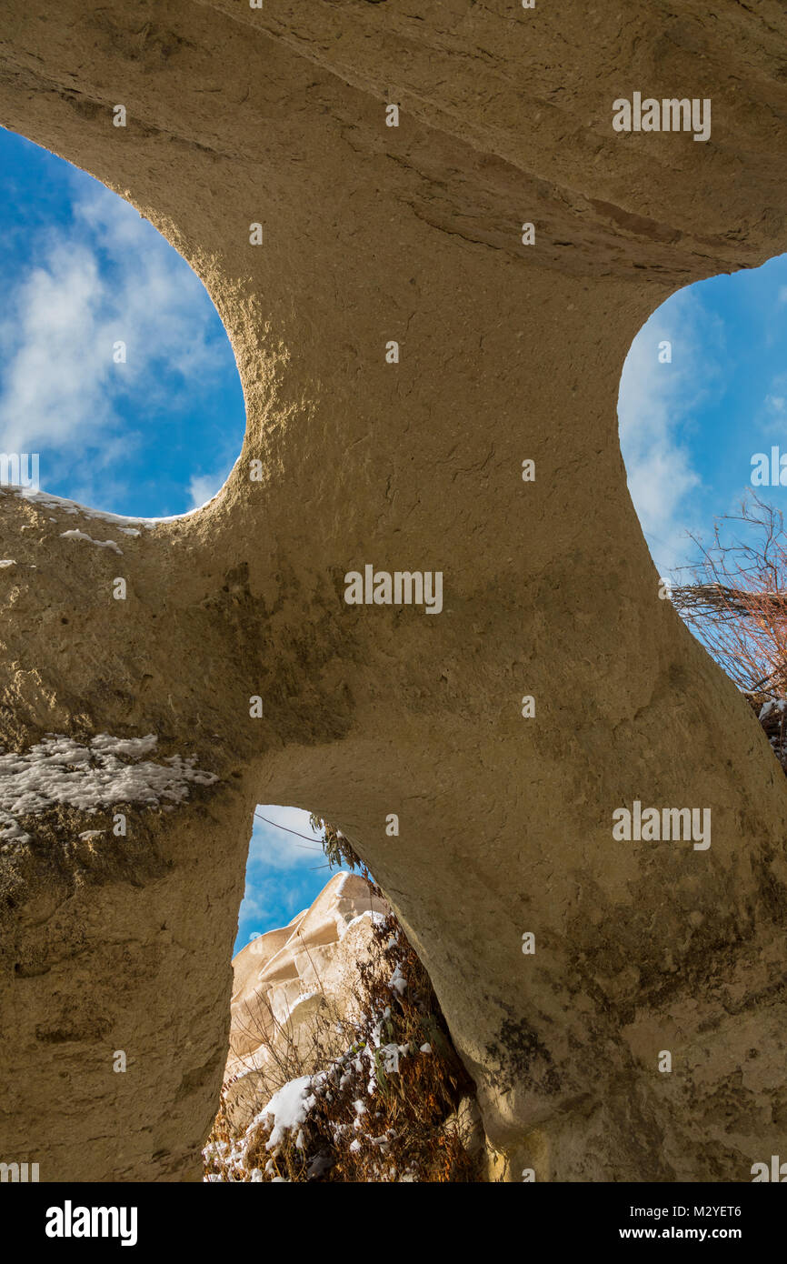 Limestone rock with tunneled hole Tunnel through the Limestone Western