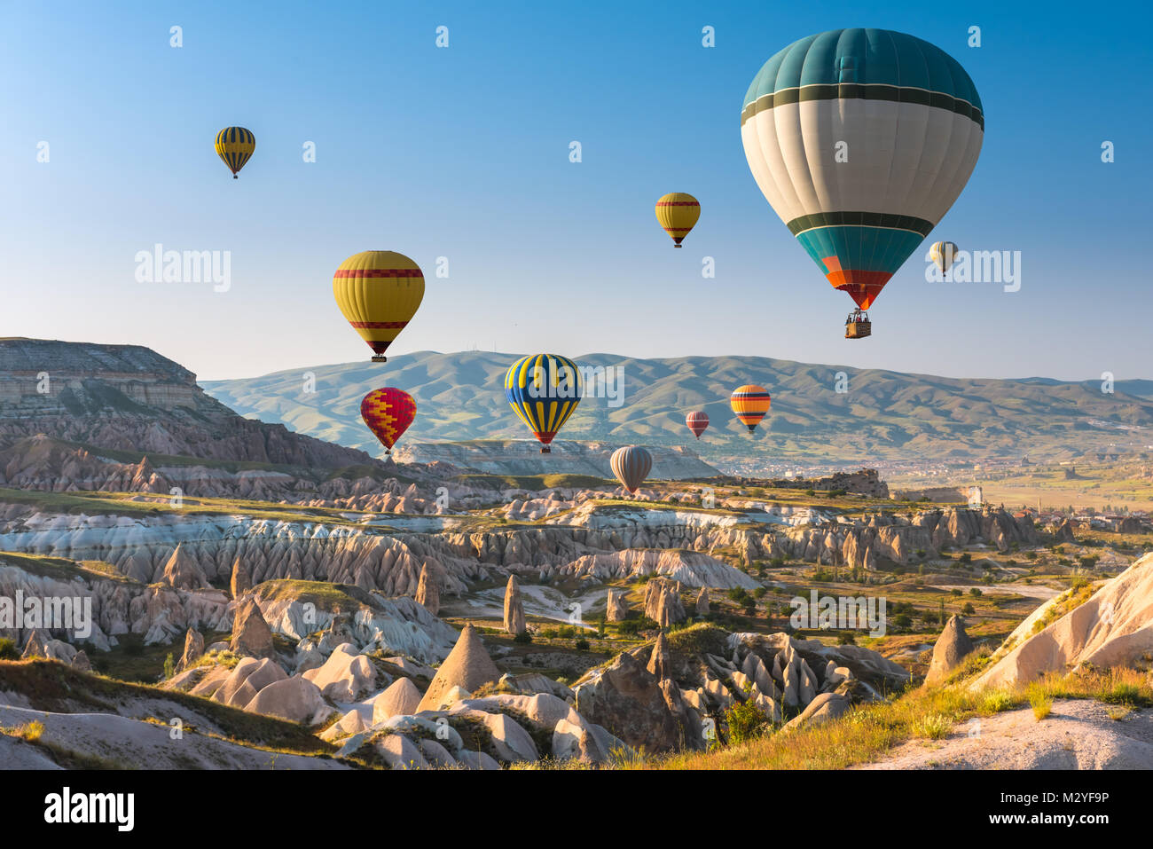 Hot air balloons flying over Cappadocia, Turkey Stock Photo