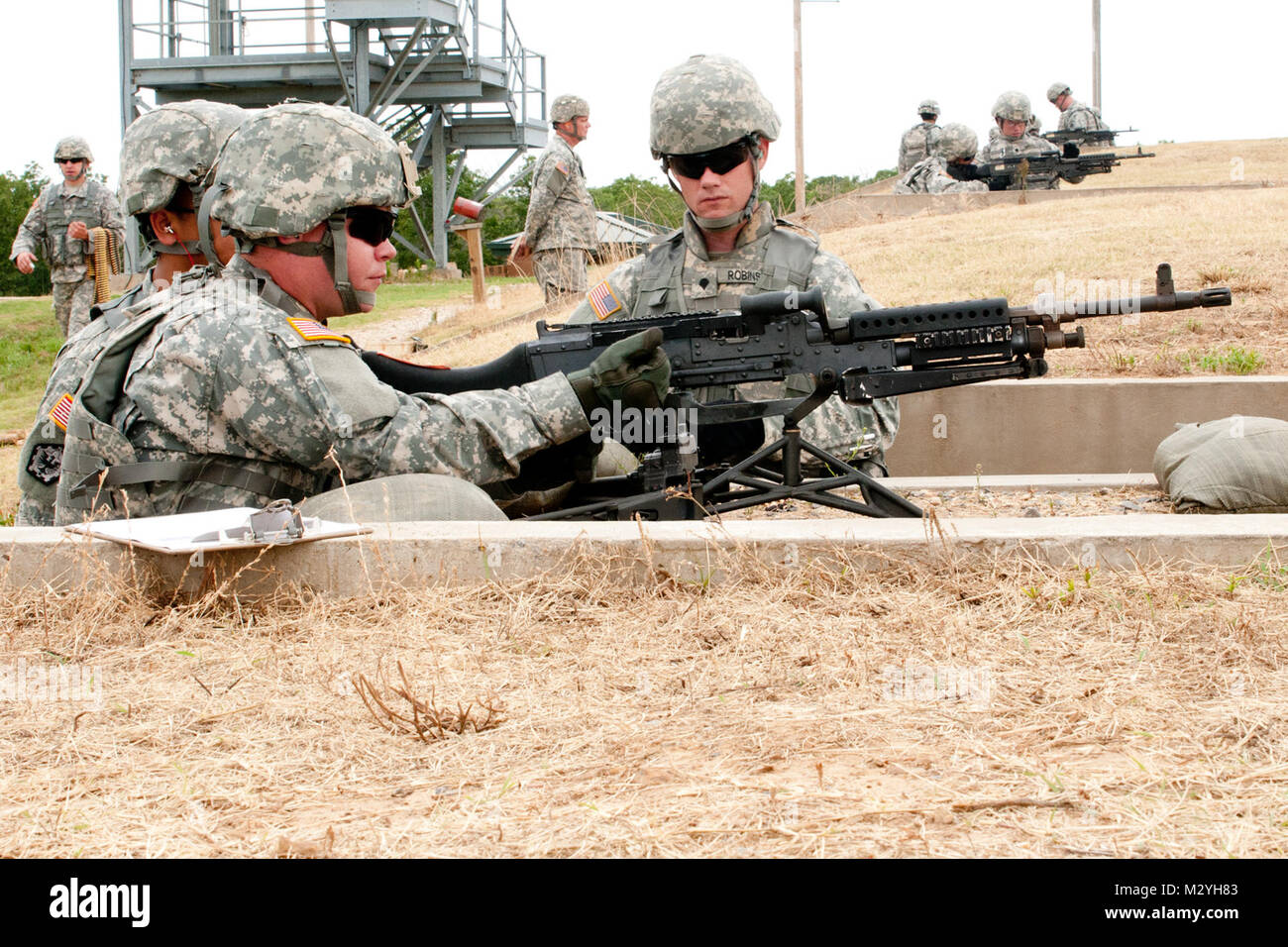 Spc. Devin Burns, [LEFT], a combat engineer with Headquarters and ...