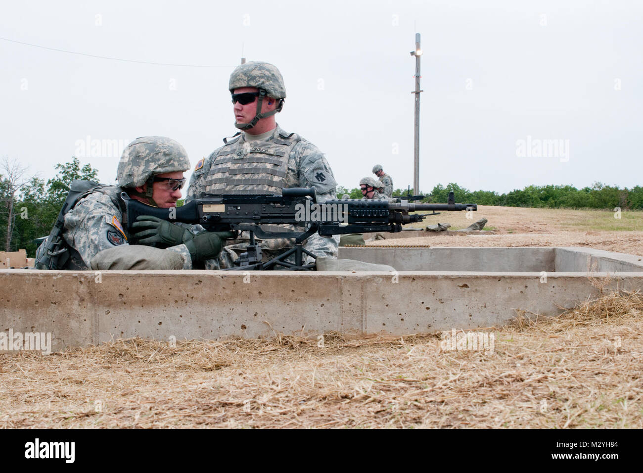Sgt. Scot Shaw, [LEFT], a heavy equipment operator with Headquarters ...