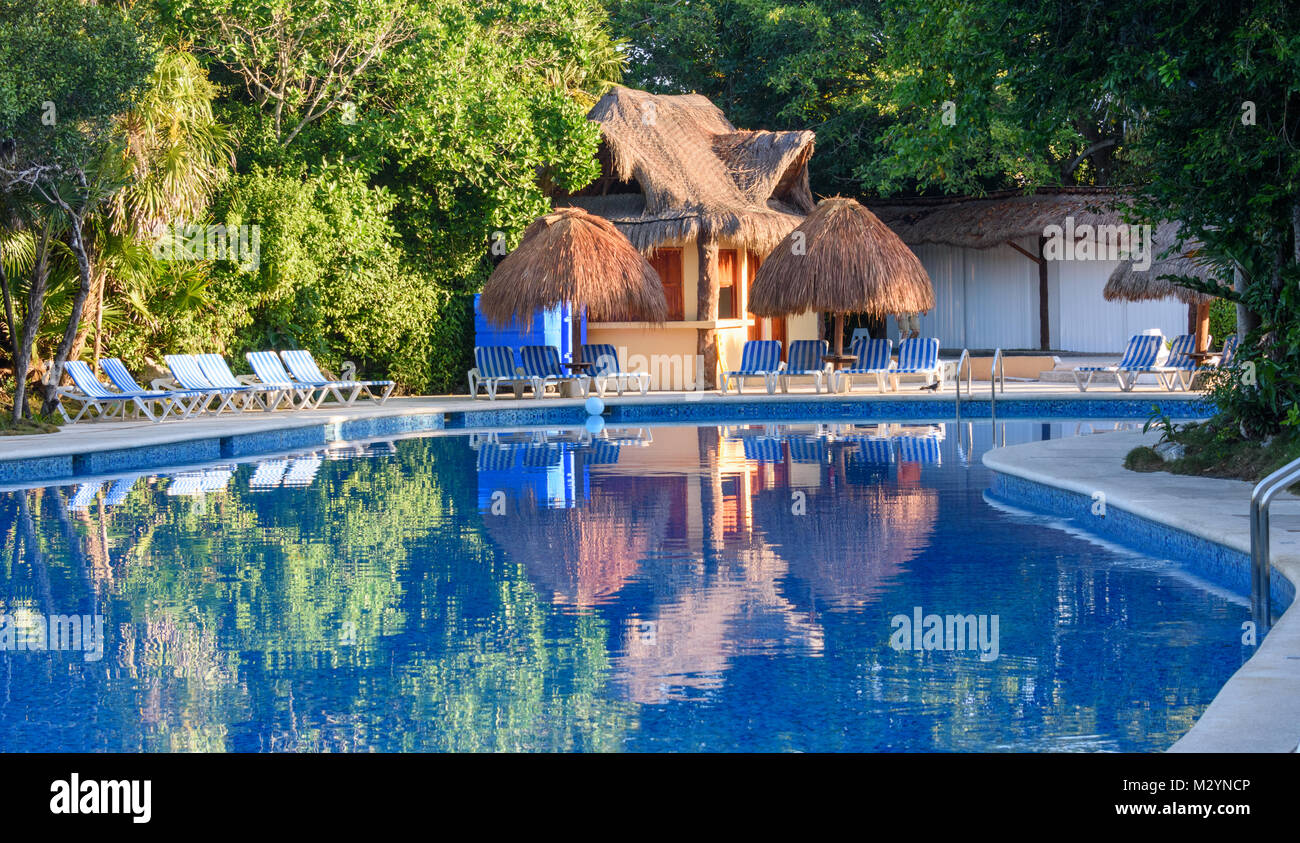 Outdoor resort swimming pool area with a Healthy Juice Bar. Riviera