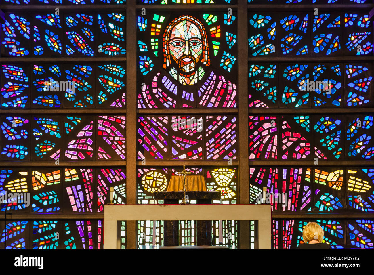 England, Devon, Buckfast Abbey, Stained Glass Window in The Blessed Sacrament Chapel depicting of Jesus Christ Stock Photo