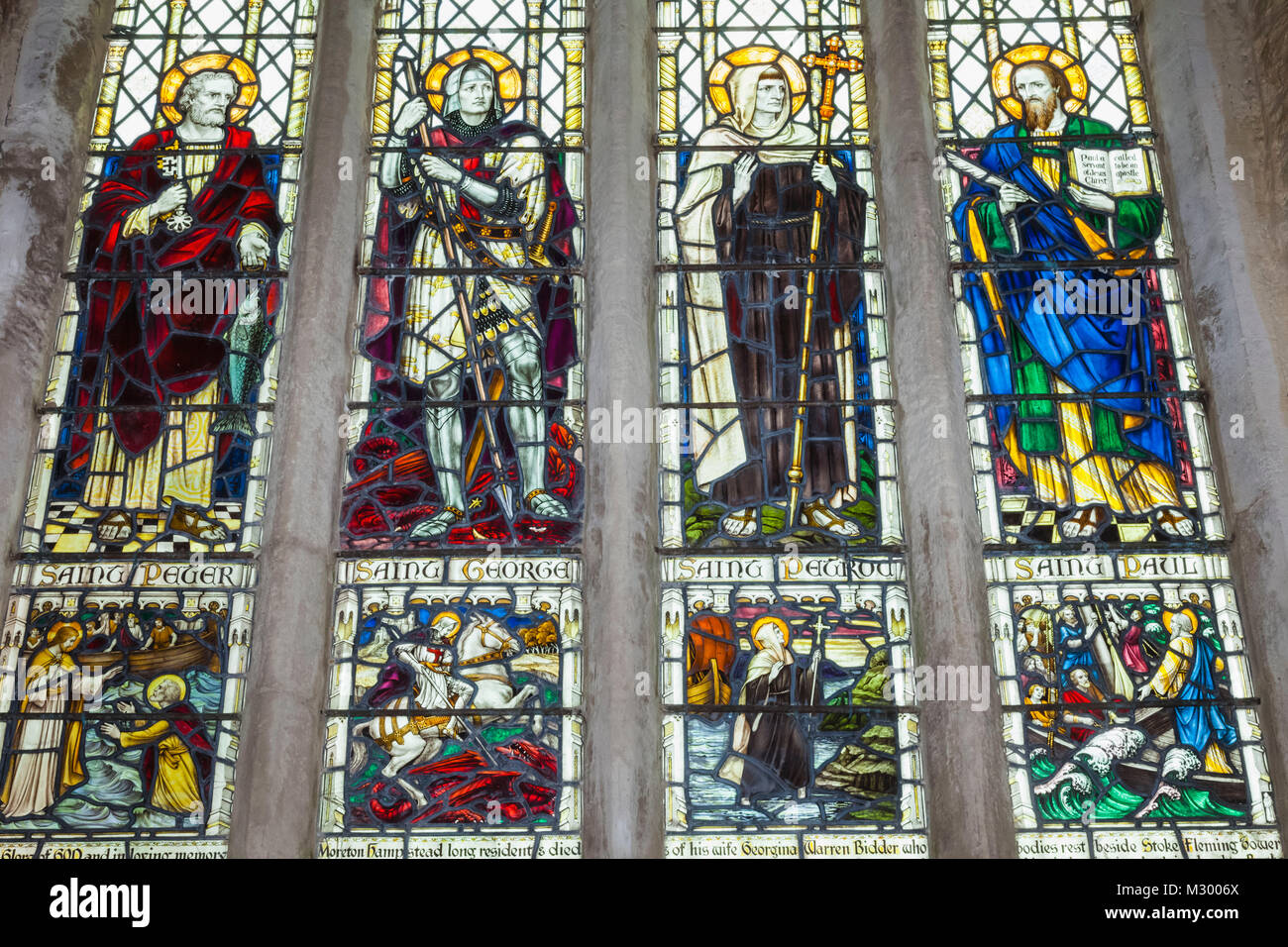 England, Devon, Dartmouth, Dartmouth Castle, St Petrox Church, Stained Glass Window depicting Various Saints Stock Photo