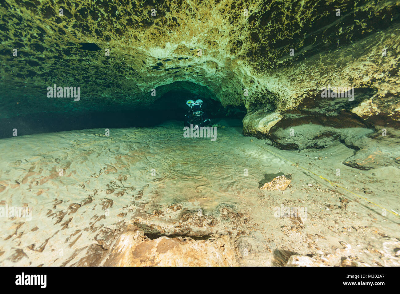 divers underwater caves diving Ginnie Springs Florida USA Stock Photo