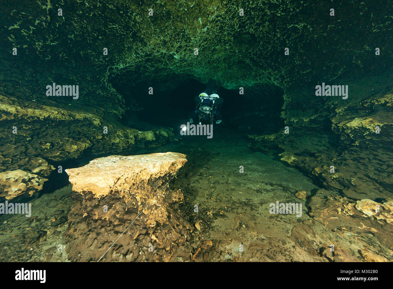 divers underwater caves diving Ginnie Springs Florida USA Stock Photo