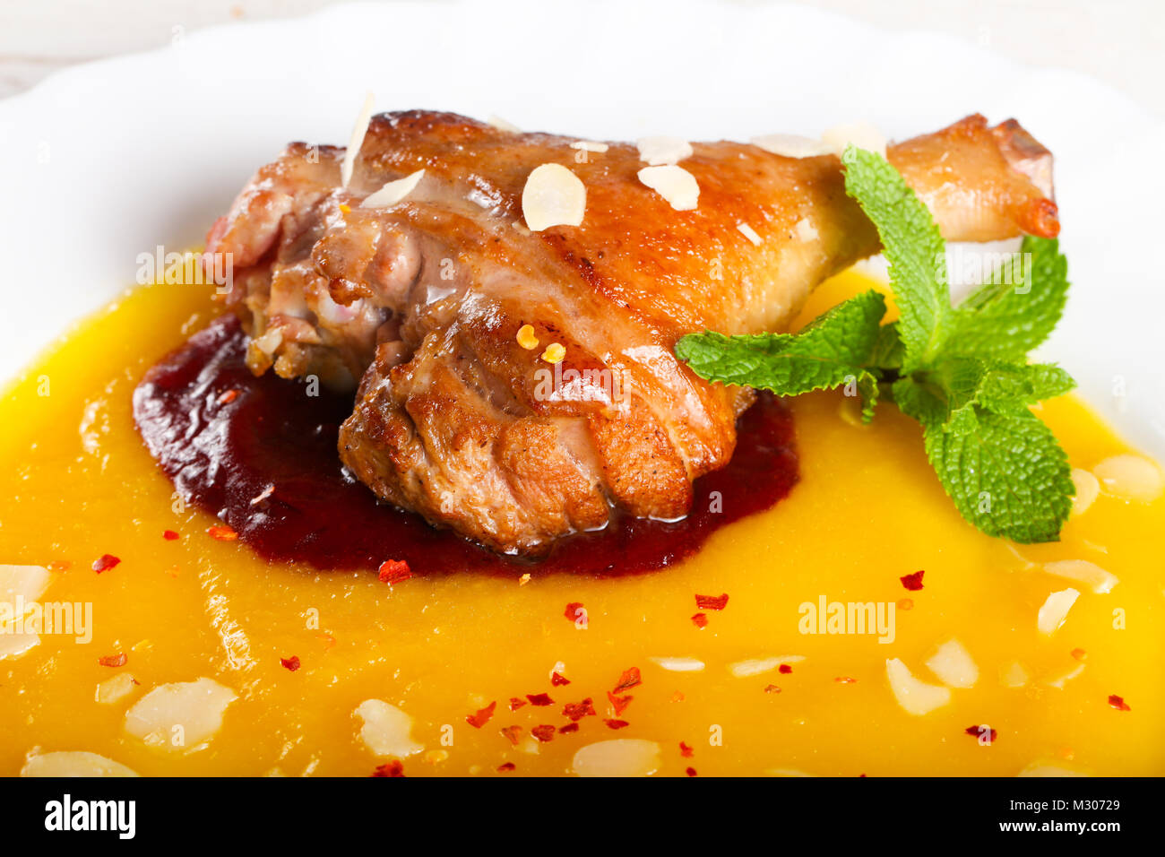Baked Duck leg Stock Photo - Alamy