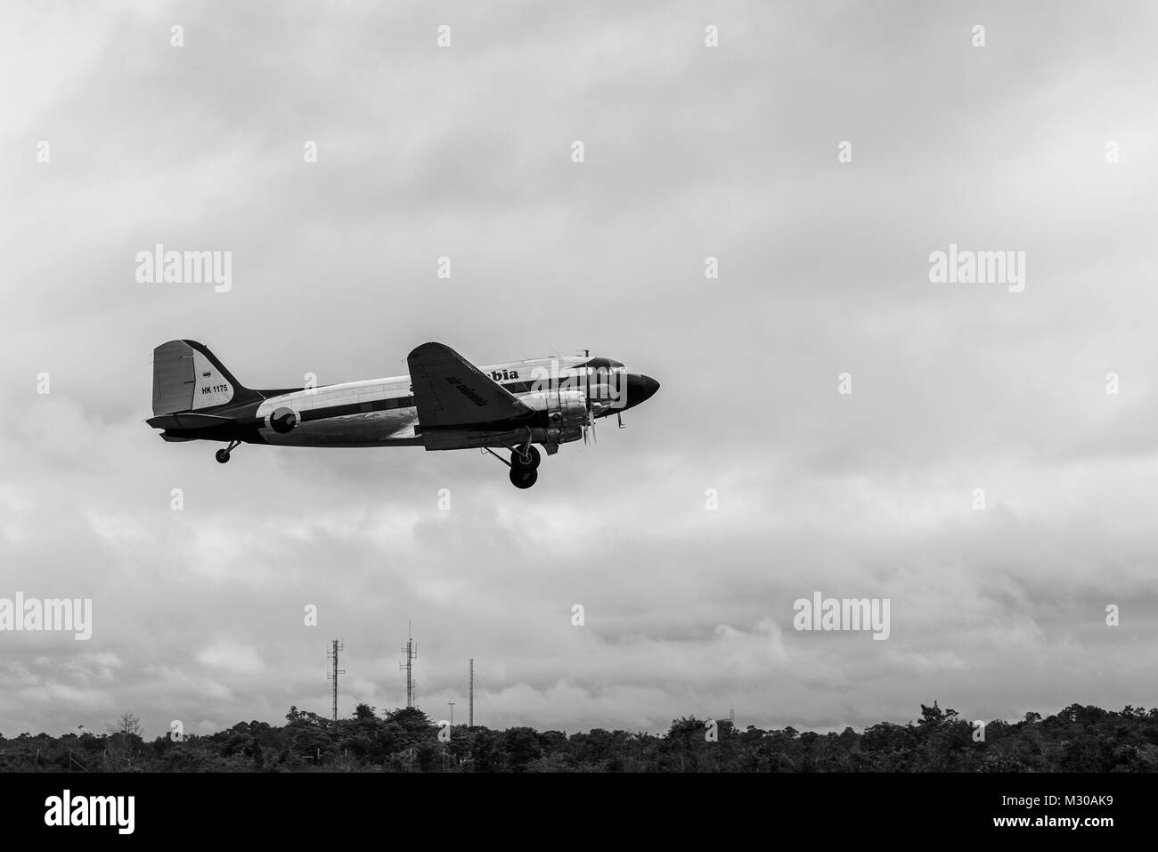 A Douglas DC-3 aircraft is seen landing at the airport of Puerto Inírida, Colombia. Stock Photo