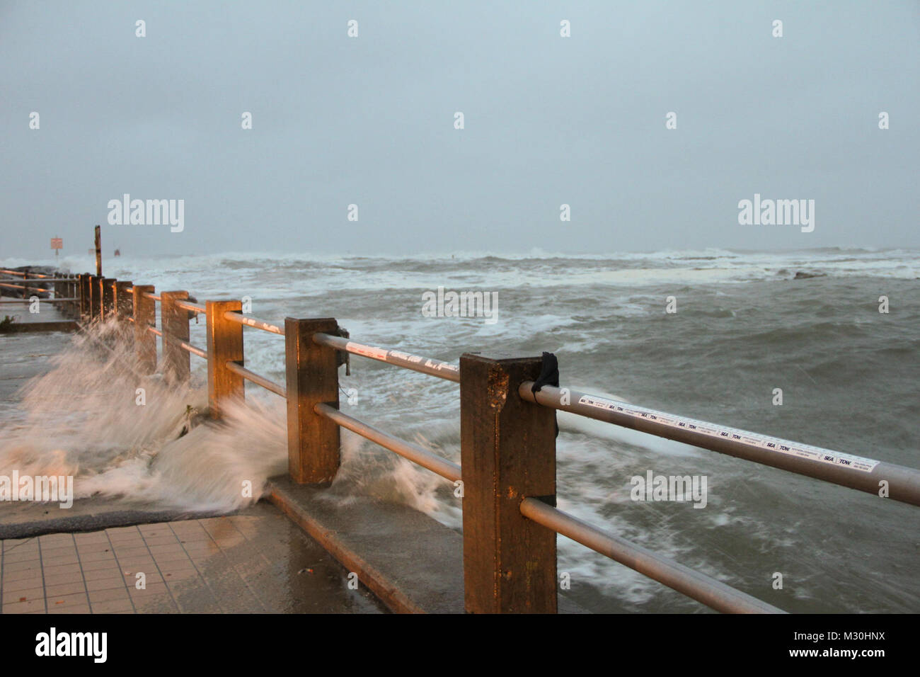 VIRGINIA BEACH, Va. Waves roll into Rudee Inlet during Hurricane