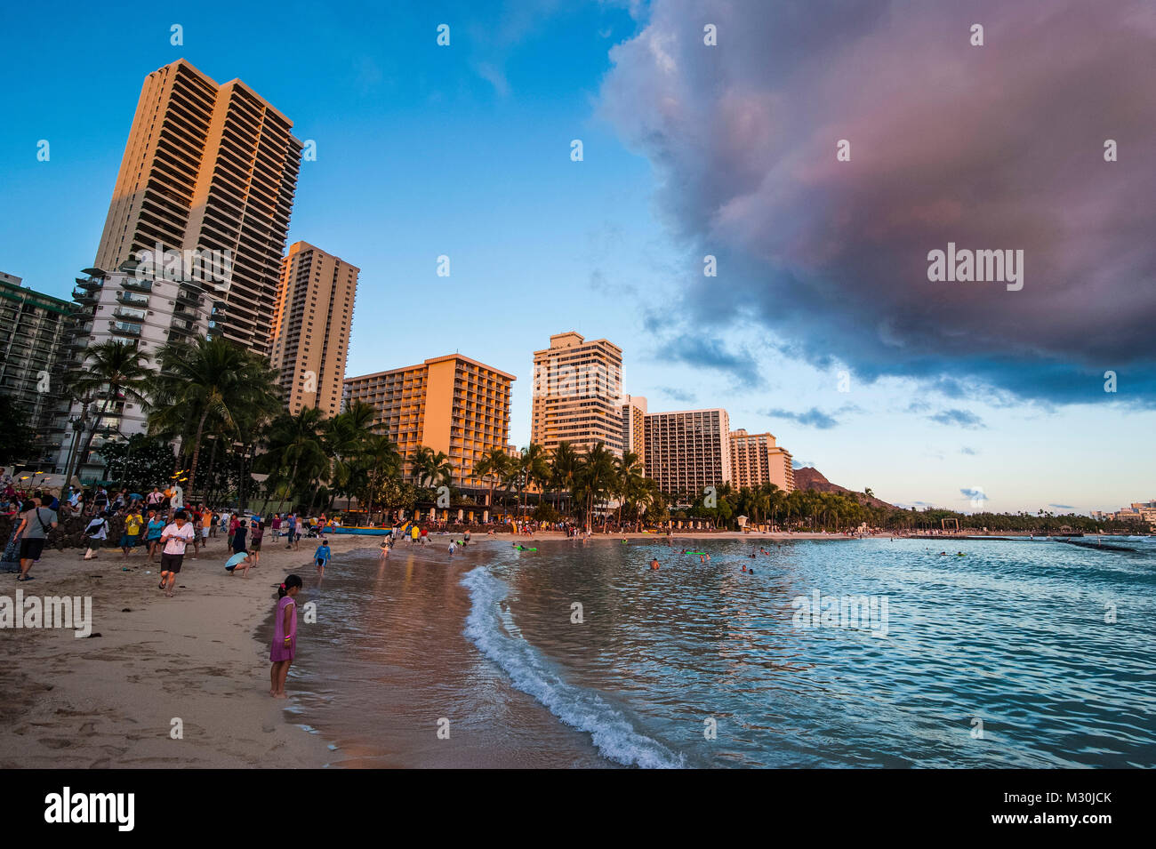 Late afternoon sun over the hotels on Waikiki Beach, Oahu, Hawaii Stock Photo
