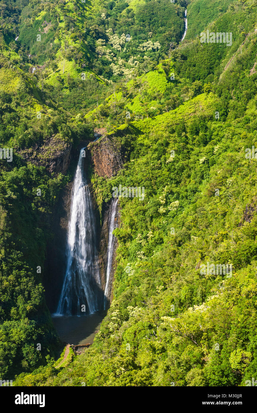 Aerial of a waterfall in the interior of Kauai, Hawaii Stock Photo