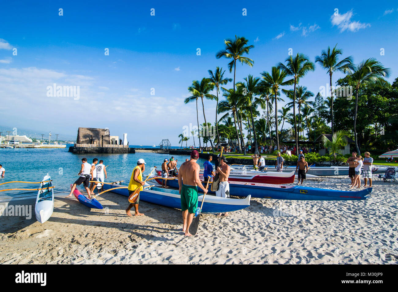 Outrigger boats on Kamakahonu beach, Kailua -Kona, Big Island, Hawaii Stock Photo