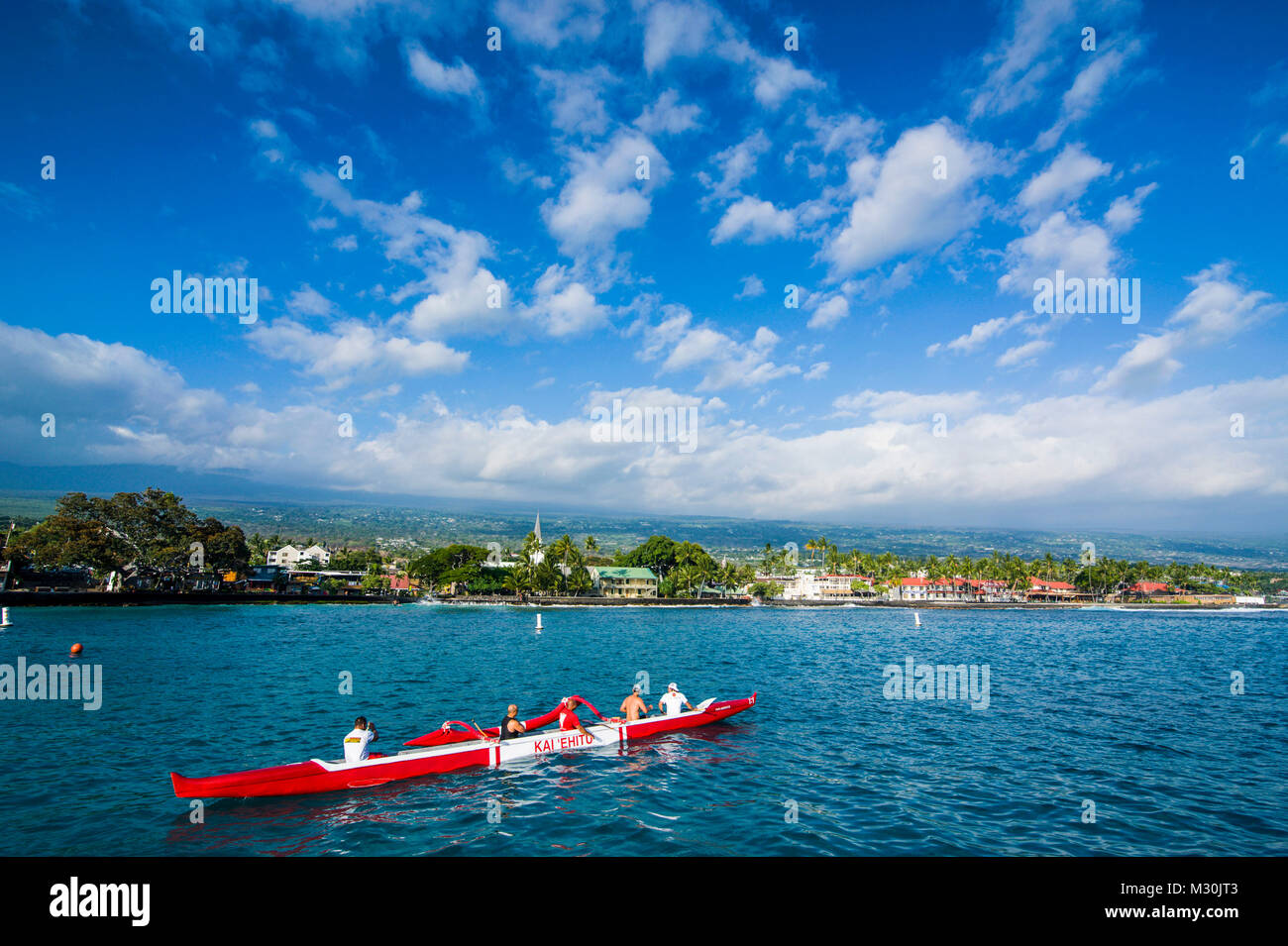 Locals working out in their outrigger canoes, Kailua -Kona, Big Island, Hawaii Stock Photo