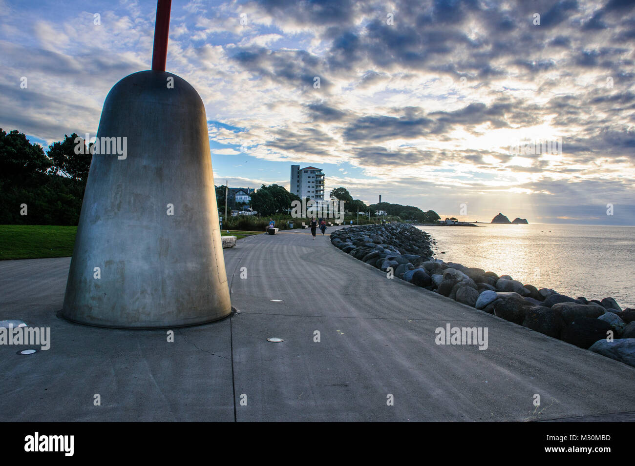 Dramatic moody sky over the  beach promenade of New Plymouth, Mount Taranaki, North Island, New Zealand Stock Photo