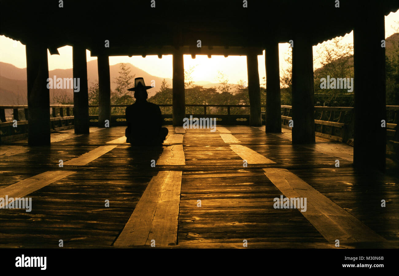 Man with hat in a temple, Pyongsansowon, Andong, South Korea, Asia Stock Photo