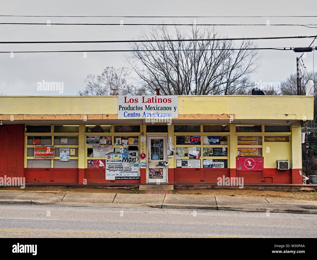 The Los Latinos hispanic market or store advertising Productos Mexicanos Y Centro Americanos, latin grocery store in Montgomery Alabama, USA. Stock Photo