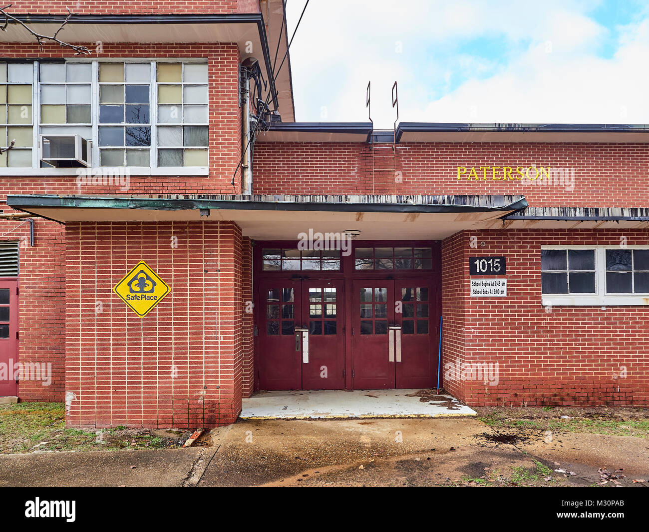 Closed and abandoned Paterson elementary school building that is dilapidated and rundown in Montgomery Alabama USA. Stock Photo