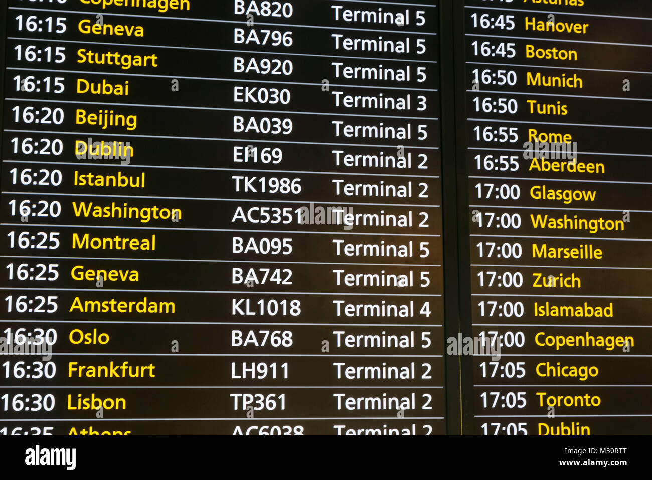 England, London, Heathrow Airport, Flight Departure Board Stock Photo