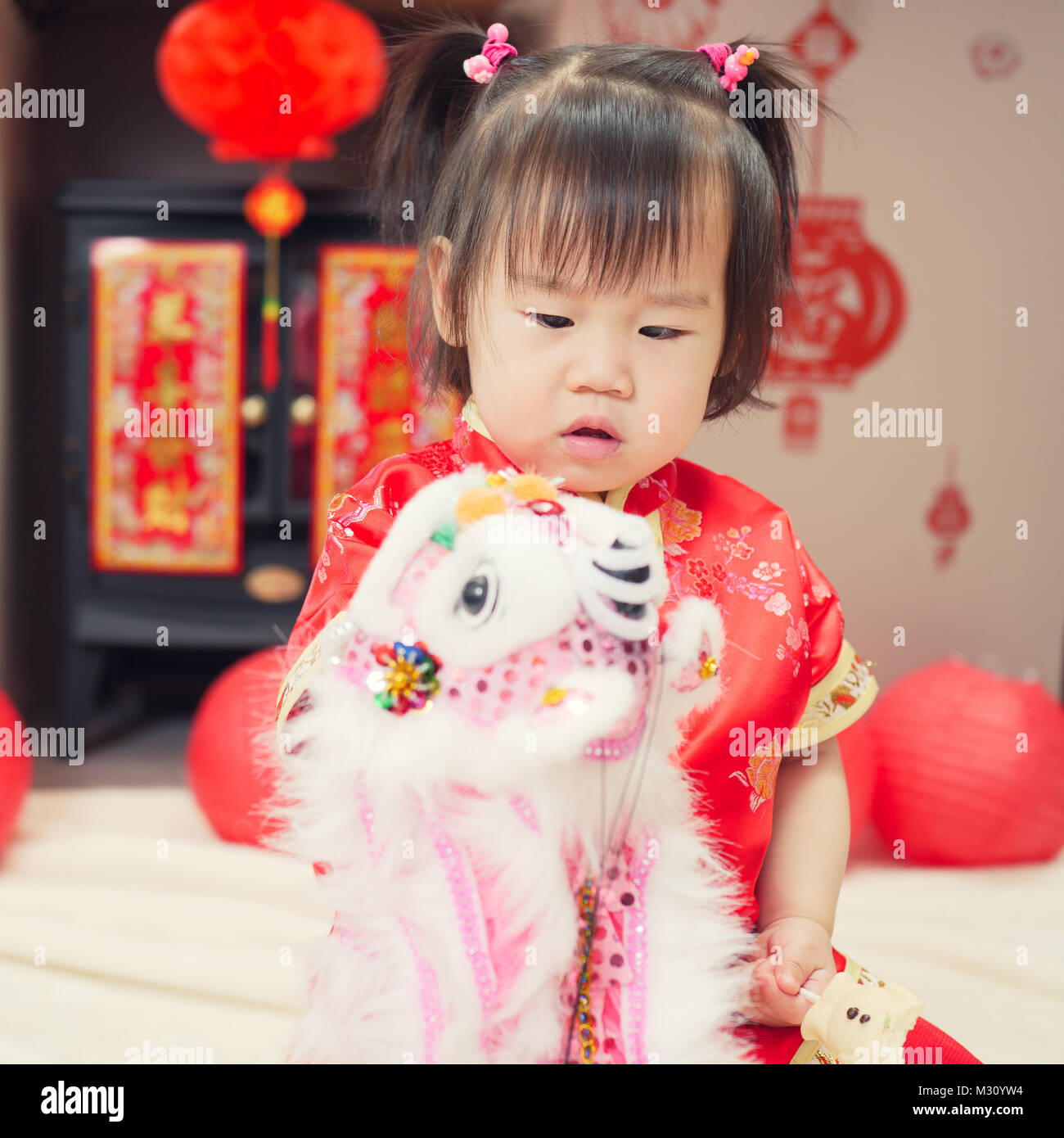 Chinese Baby Girl With Traditional Dressing Up And Fu Means