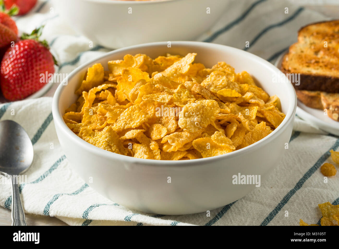 Healthy Corn Flakes with Milk for Breakfast with Fruit Stock Photo Alamy
