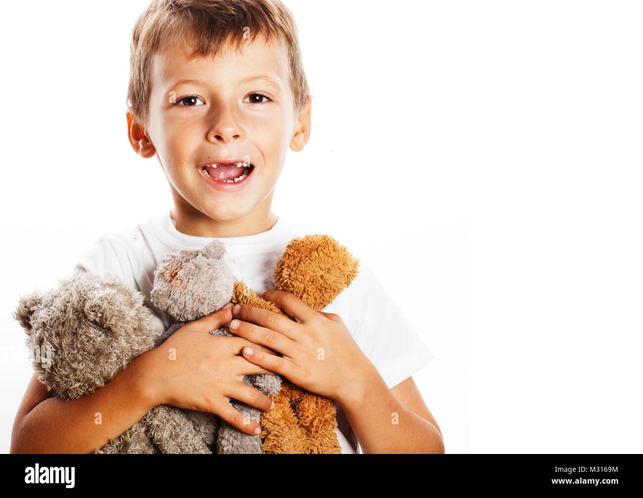 little cute boy with many teddy bears hugging isolated close up Stock ...