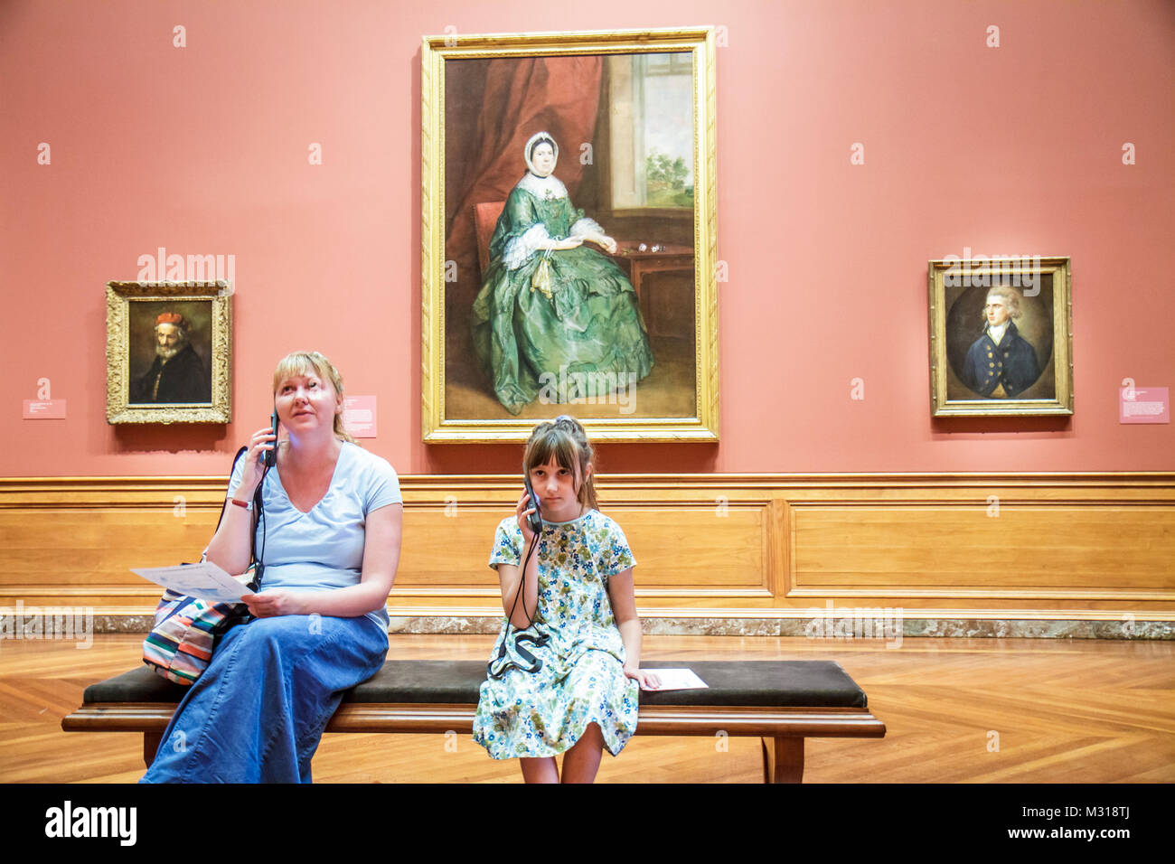 Baltimore Maryland,Baltimore Museum of Art,Wyman Park,gallery,Cone collection,painting,mother daughter girl listening audio tour Stock Photo