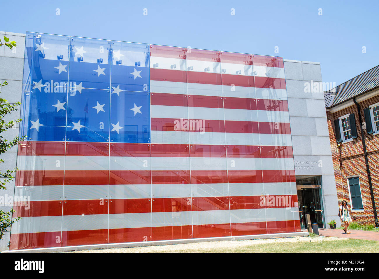 Baltimore Maryland,East Pratt Street,Star Spangled Banner Flag House,building,facade,red white & blue,woman female women,walking,museum,history,large, Stock Photo