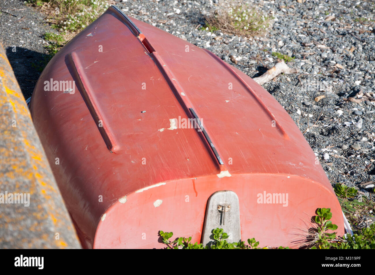 Upside Down Dinghy On A Beach Stock Photo Alamy