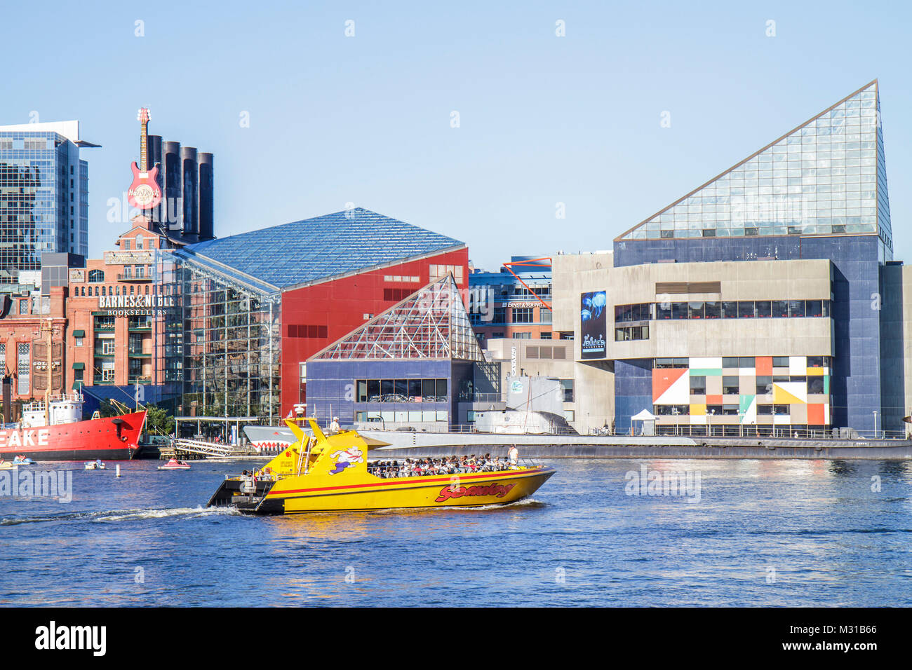 Baltimore Maryland,Inner Harbor,harbour,Harborplace,Patapsco River,waterfront,National Aquarium,skyline,Seadog Speedboat Cruises,boat,passenger passen Stock Photo