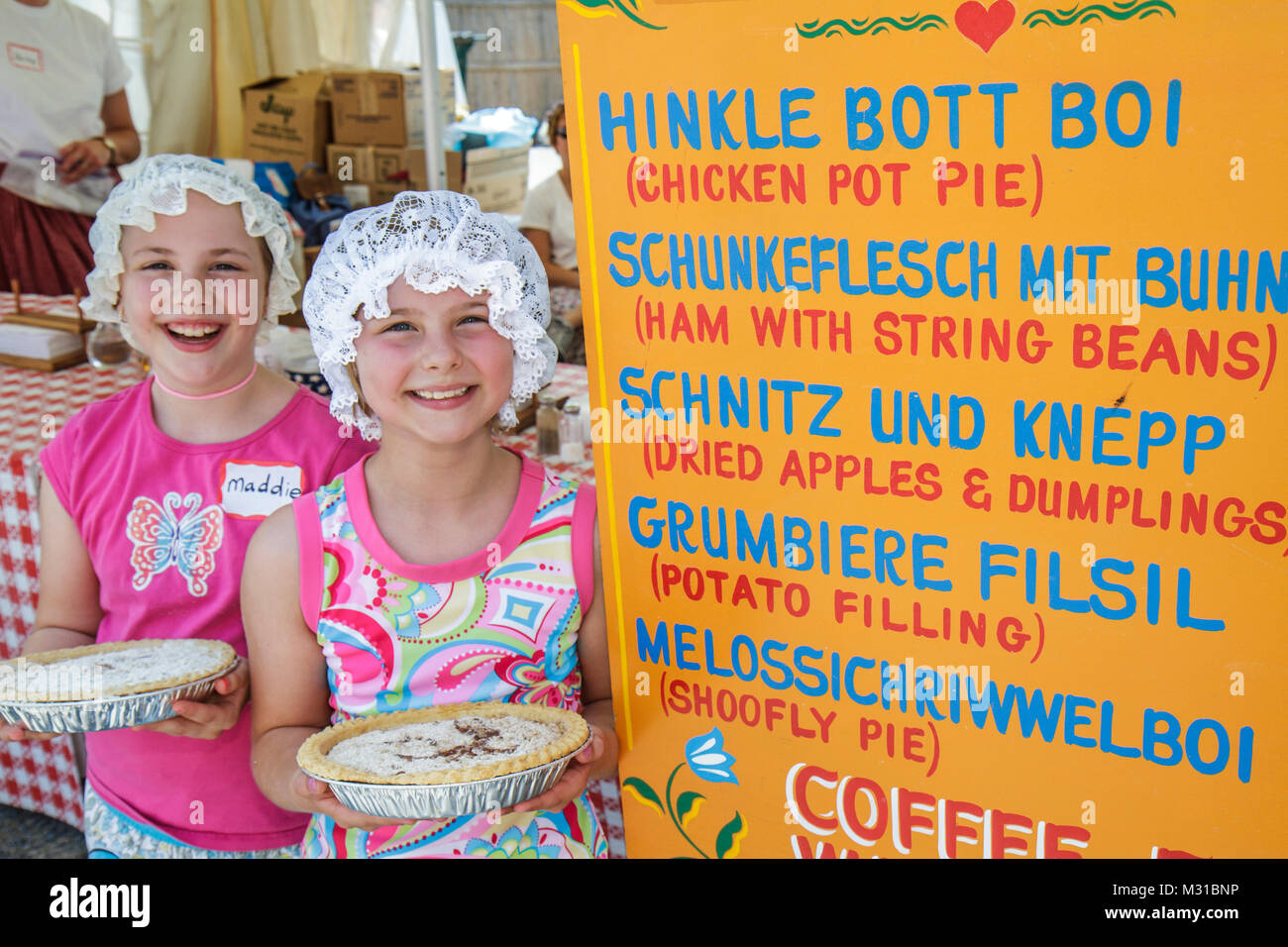 Kutztown Pennsylvania,Kutztown Folk Festival,Pennsylvania Dutch folklife,heritage,sign,traditional food,schnitz,vendor vendors stall stalls booth mark Stock Photo
