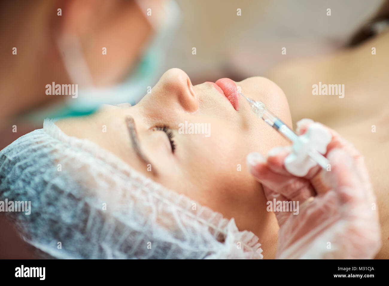 Cosmetic injection in the spa salon.  Stock Photo