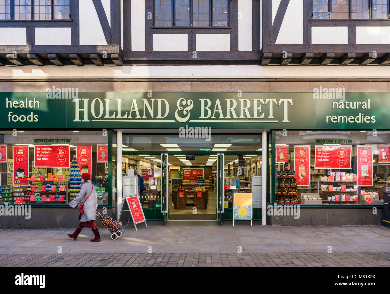 Front facade of a 'Holland and Barrett' shop along the High Street in Winchester February 2018, England, UK Stock Photo