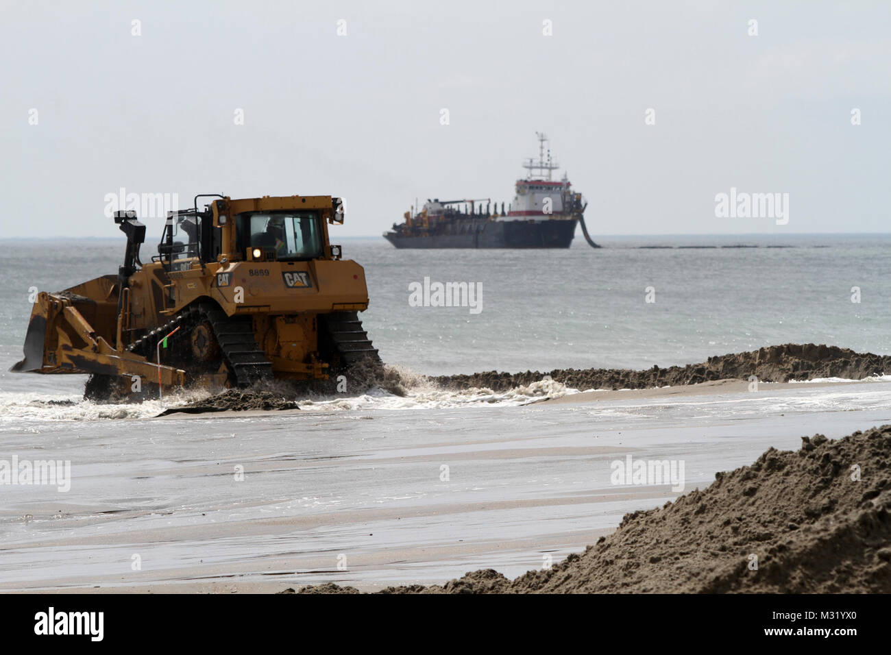 The hopper dredges BE Lindholm is anchored off the coast of Sandbridge