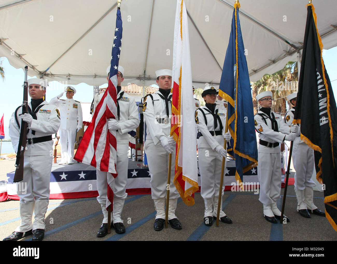 140801-N-HW977-163 NORCO, Calif. (Aug. 1, 2014) U.S. Naval Sea Cadet Corps Paul Revere Division Color Guard posts colors during Change of Command ceremony at Naval Surface Warfare Center (NSWC), Corona Division, tranferring the reins from Capt. Eric Ver Hage to Capt. (Sel) Steve Murray. In his keynote address Rear Adm. Lawrence Creevy, commander, Naval Surface Warfare Center, remarked Ver Hage's most important qualities were vision, accomplishment and leadership, presenting Ver Hage with the Legion of Merit. Creevy's list of highlights from Ver Hage's tour at NSWC Corona include establishing h Stock Photo