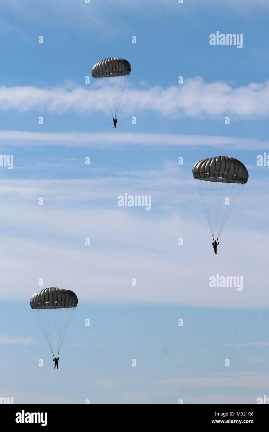 Paratroopers Count on Their Chutes by National Guard Stock