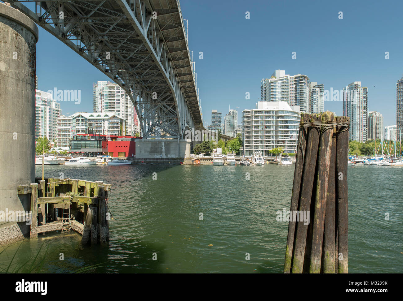 Vancouver, British Columbia, Canada.  Looking northeast at Granville Street Bridge and Downtown from Granville Island. Stock Photo