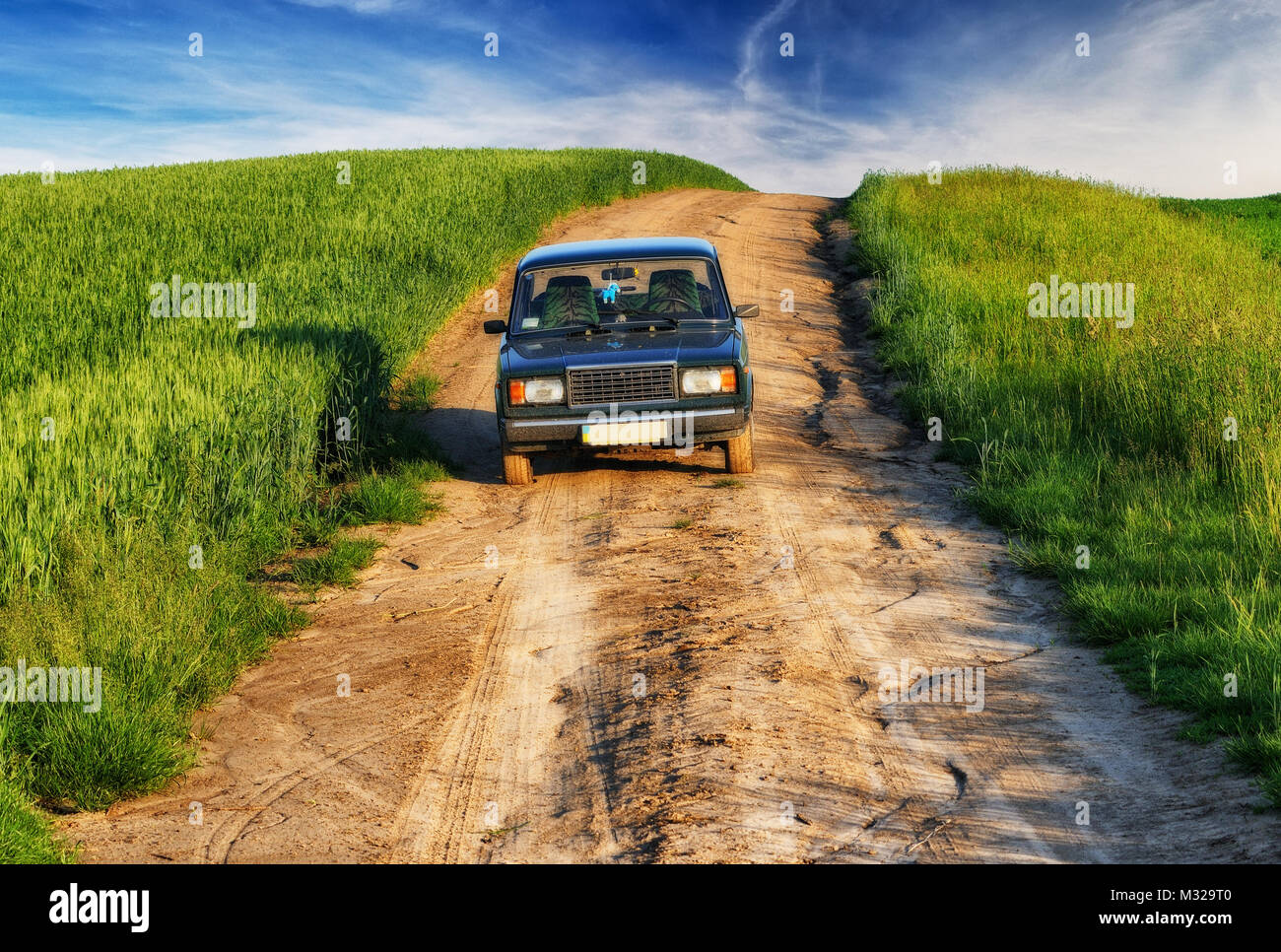 Car in crop field hi-res stock photography and images - Alamy