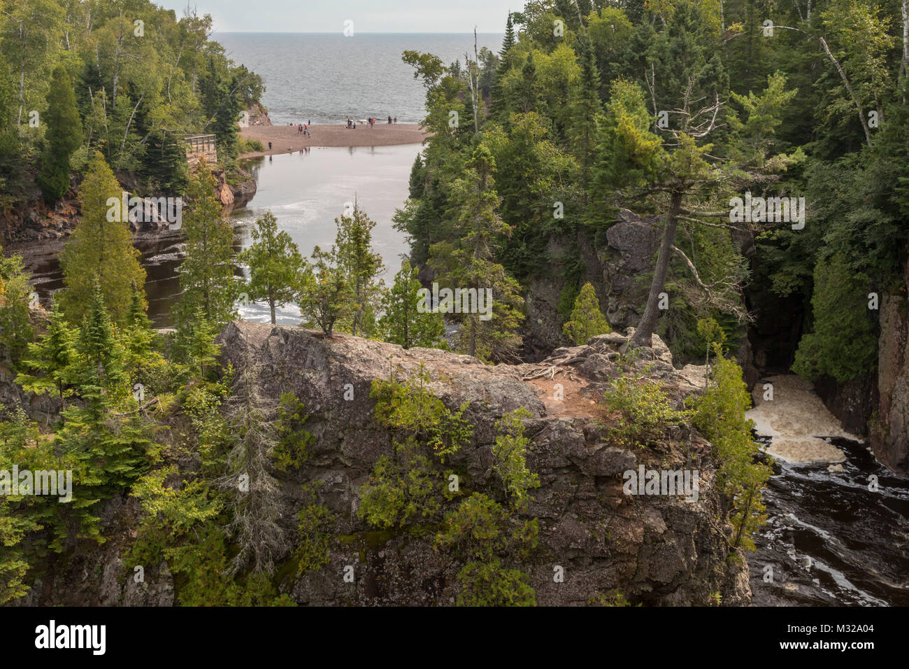 Silver Bay, Minnesota - Baptism River, where it meets Lake Superior in Tettegouche State Park. Stock Photo