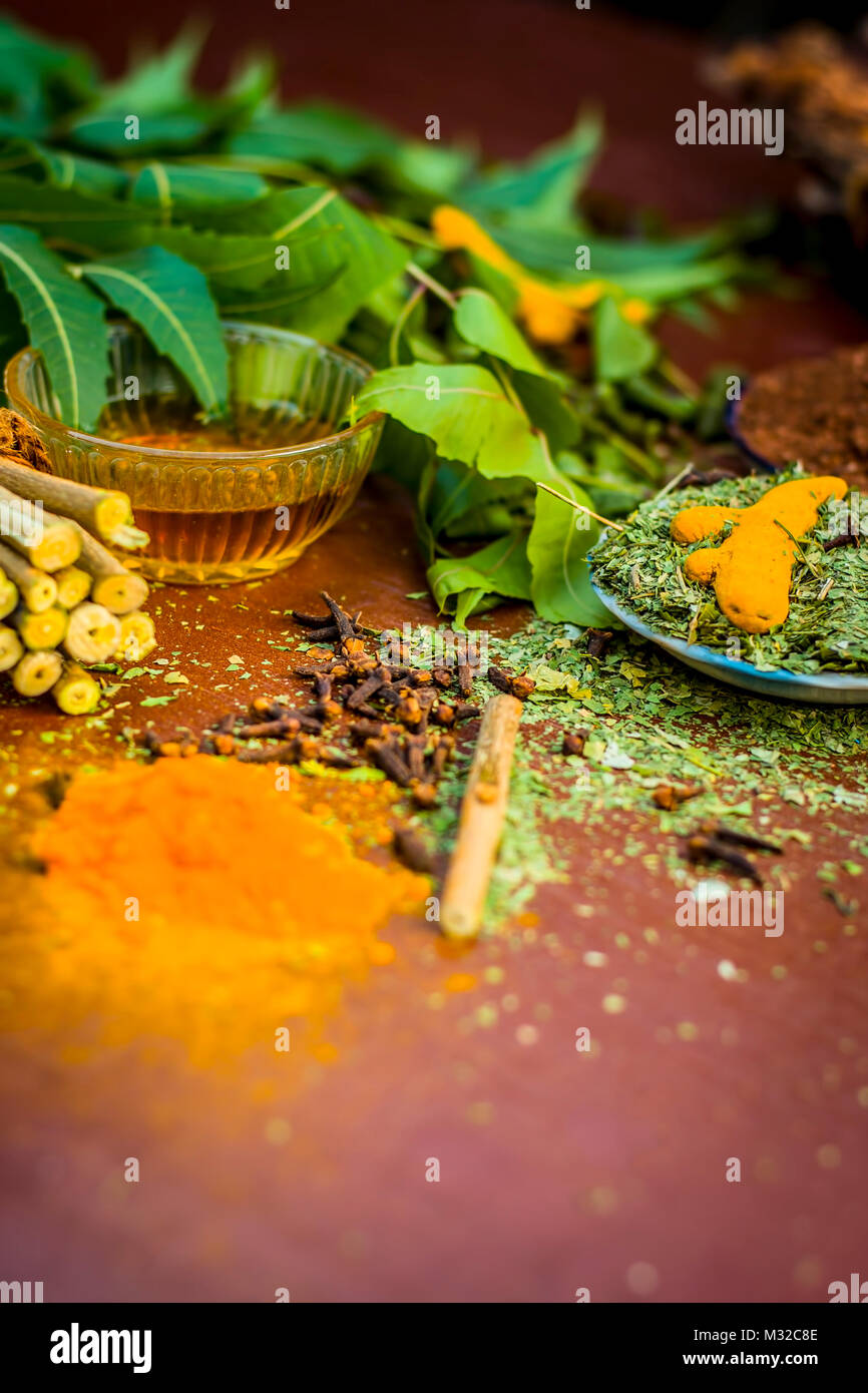 Close up of ingredients of ayurvedic treatment i.e neem,neem leaves ...