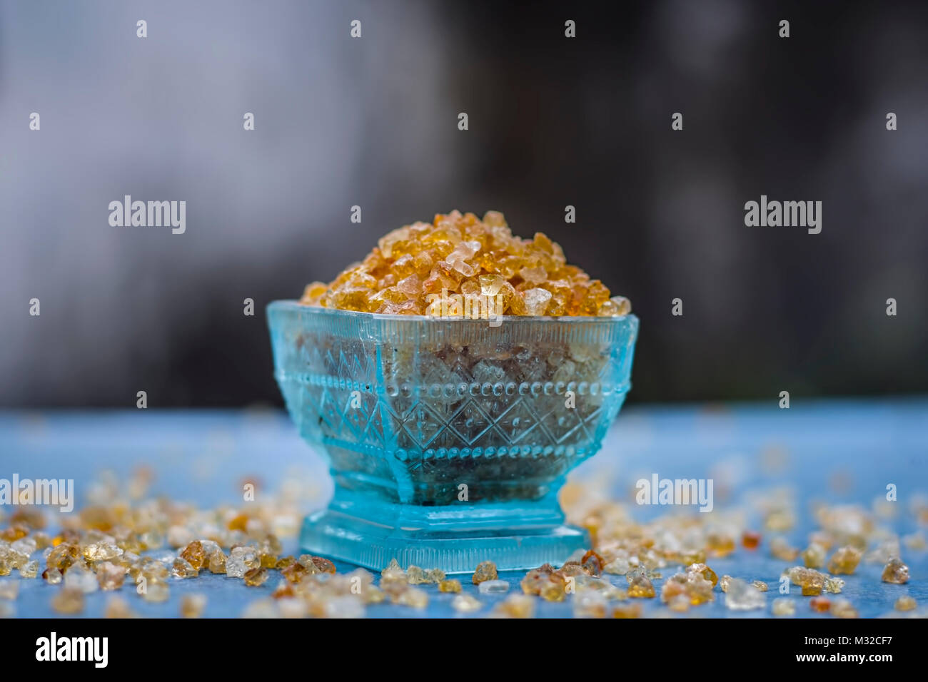 Close up of Edible gum,Gond,acacia gum in a blue colored bowl. Stock Photo