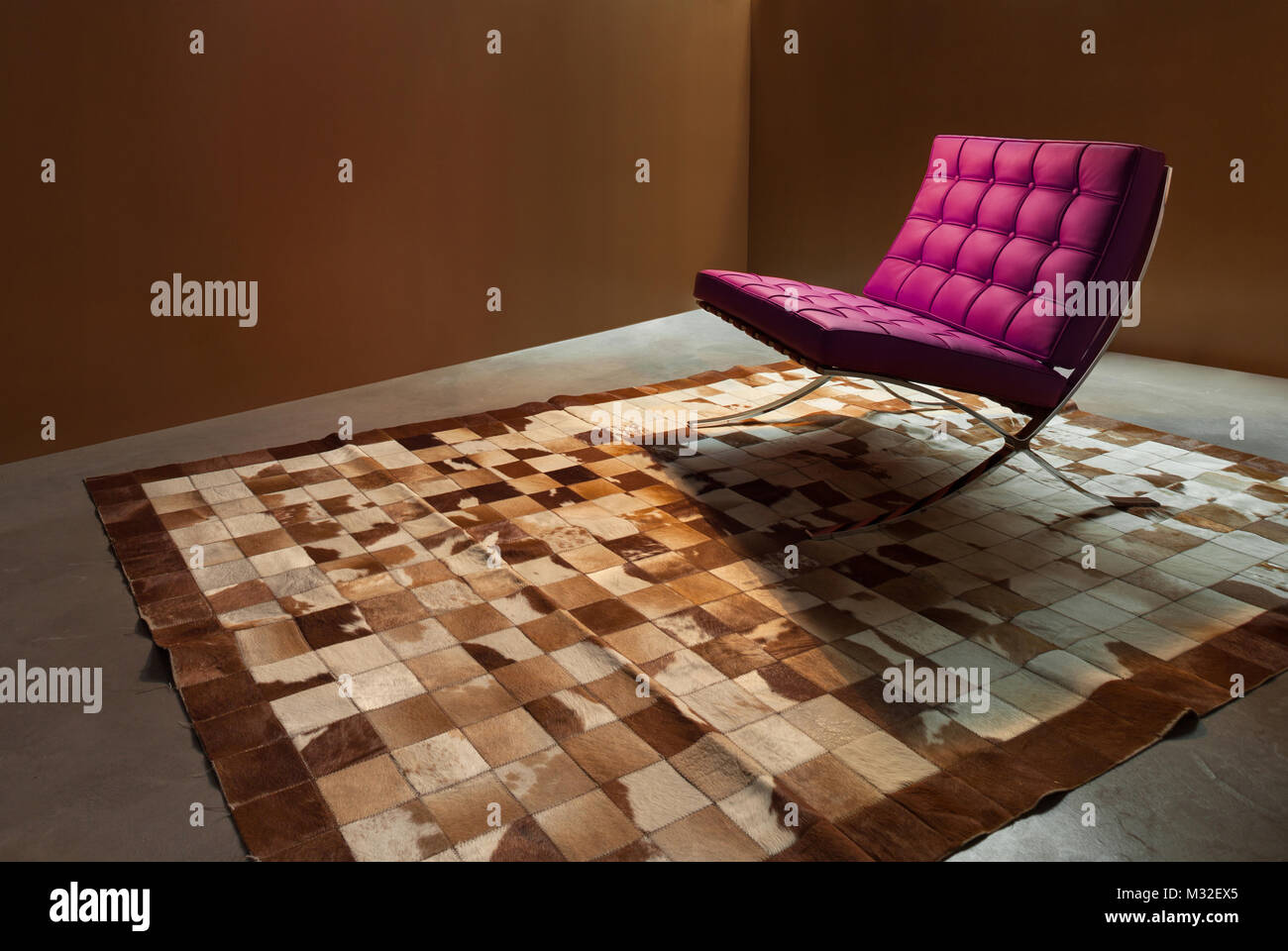 Interior modern house, room with leather armchair and carpet Stock Photo