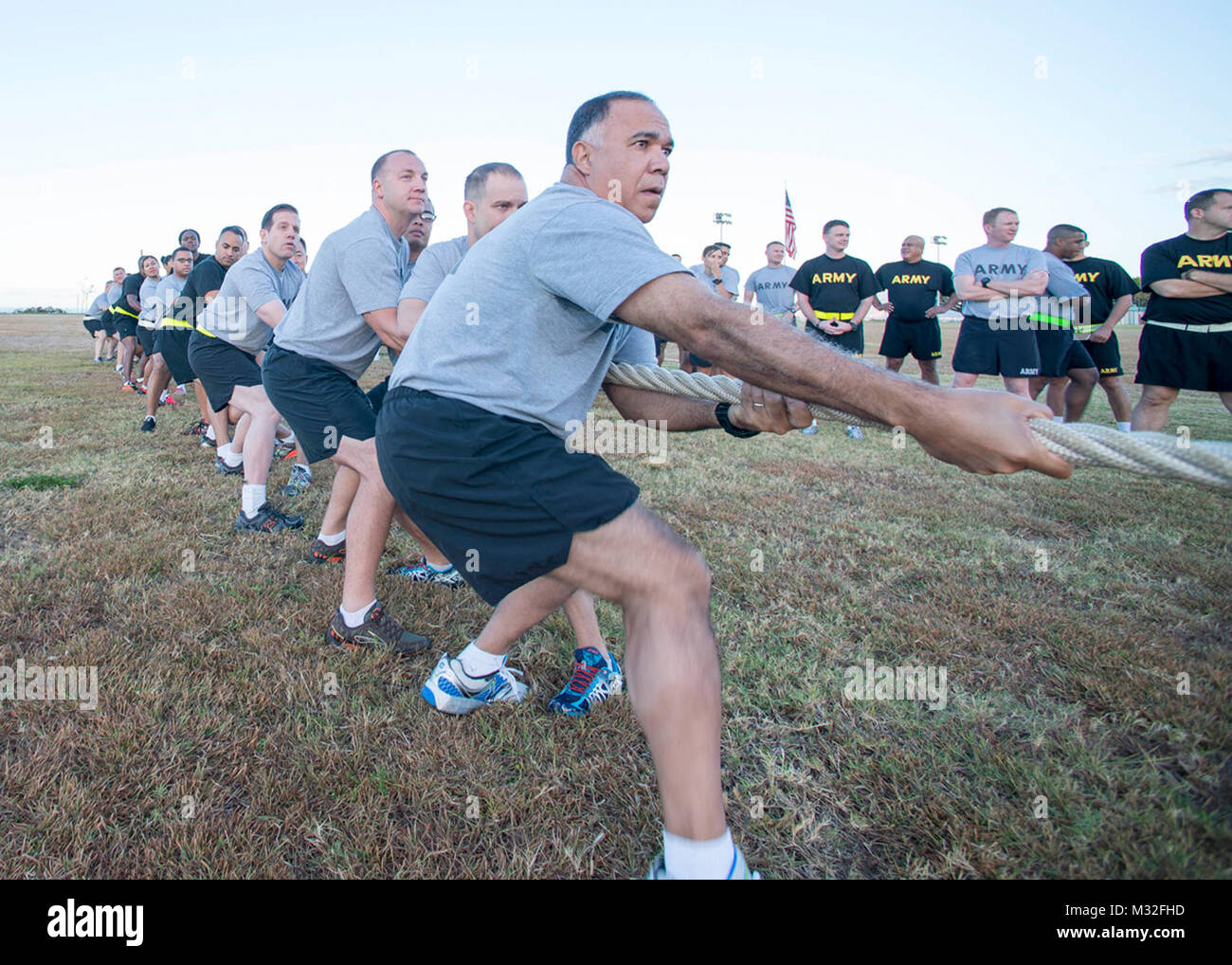 150612-N-DX698-071 CAMP H.M. SMITH, Hawaii (June 12, 2015) Joint Services assigned to U.S. Pacific Command participate in a tug-of-war event to celebrate the 240th birthday of the U.S. Army. (U.S. Navy photo by Mass Communication Specialist 1st Class Jay M. Chu/Released) A tug-of-war event to celebrate the 240th birthday of the U.S. Army by #PACOM Stock Photo