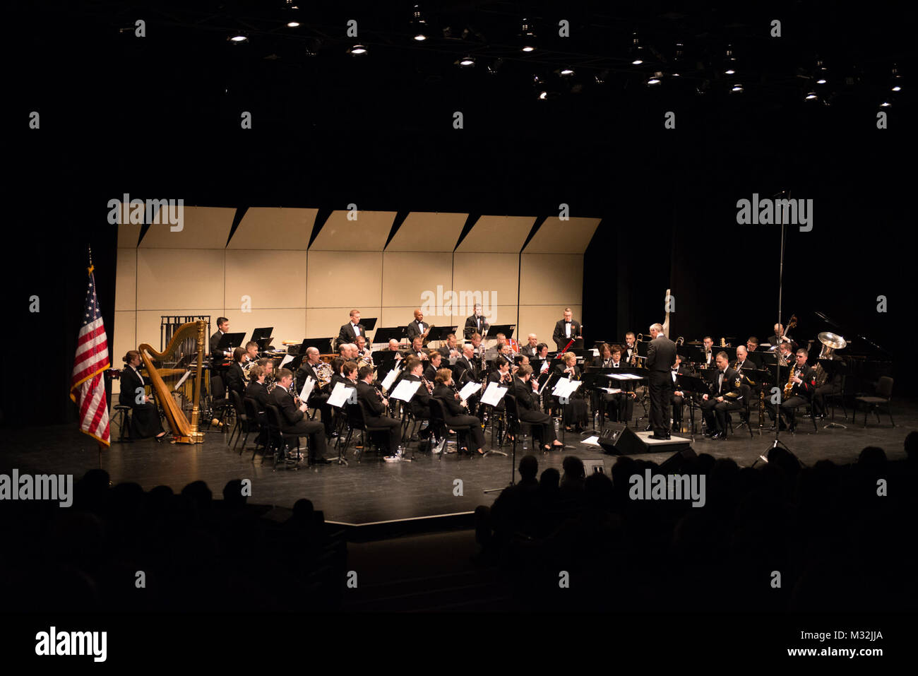 WEST HARTFORD, CT (Mar. 11, 2016) Captain Kenneth Collins conducts the United States Navy Concert Band at University of Hartford Lincoln Theatre in West Hartford, Ct. The U.S. Navy Band is on a 25-day tour of the northeastern United States. (U.S. Navy photo by Chief Musician Melissa Bishop/Released) 160311-N-NW255-140 by United States Navy Band Stock Photo