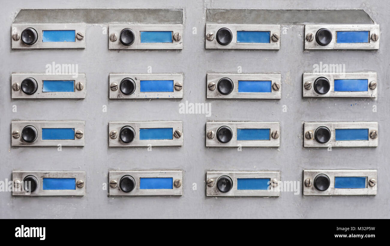 old panel with door bell buttons Stock Photo