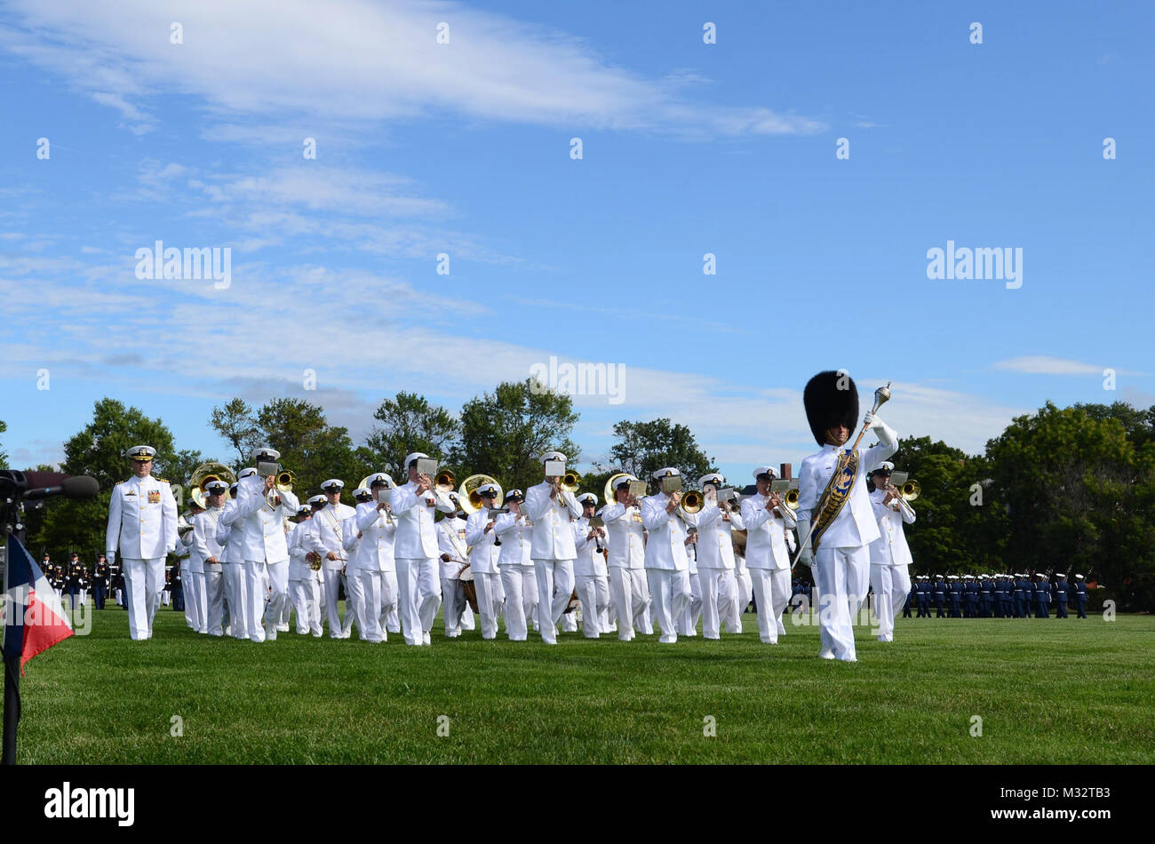 140912-N-HG258-116 ARLINGTON, VA. (September 12, 2014)  Senior Chief Musician Michael Bayes, drum major for the U.S. Navy Ceremonial Band, leads the Band off of Summerall Field after a pass-in-review at Joint Base Myer-Henderson Hall in Virginia. The United States Navy Band provided ceremonial music for the Armed Forces Farewell Tribute  in honor of Senator Carl M. Levin and Congressman Howard 'Buck' McKeon. (U.S. Navy Photo by MUC Stephen Hassay/Released) Armed Forces Farewell Tribute by United States Navy Band Stock Photo