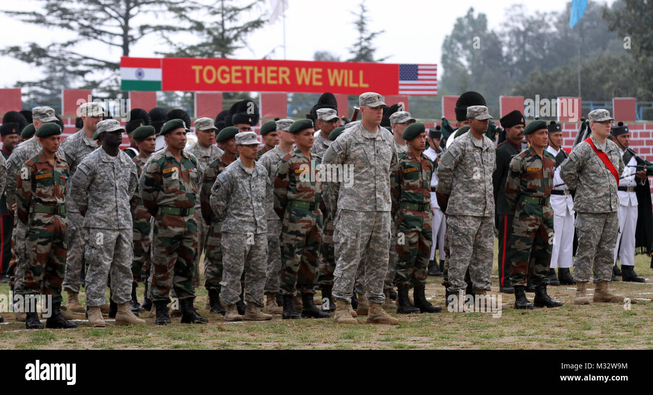 Soldiers from 1st Stryker Brigade Combat Team, 25th Infantry Division and the 2nd Battalion, 9th Ghurak Regiment of the Indian Army take part in the closing ceremonies for exercise Yudh Abhyas 14 at Chaubattia, India Sept. 30, 2014. More than 100 U.S. Soldiers participated in the exercise, which began Sept. 17 and too place at Ranikhet Cantonment, Utterakhand, India. Yudh Abhyas is an U.S. Army Pacific Command sponsored exercise and is geared toward enhancing cooperation and coordination through training and cultural exchanges and building skills and relationships necessary during a peacekeepi Stock Photo