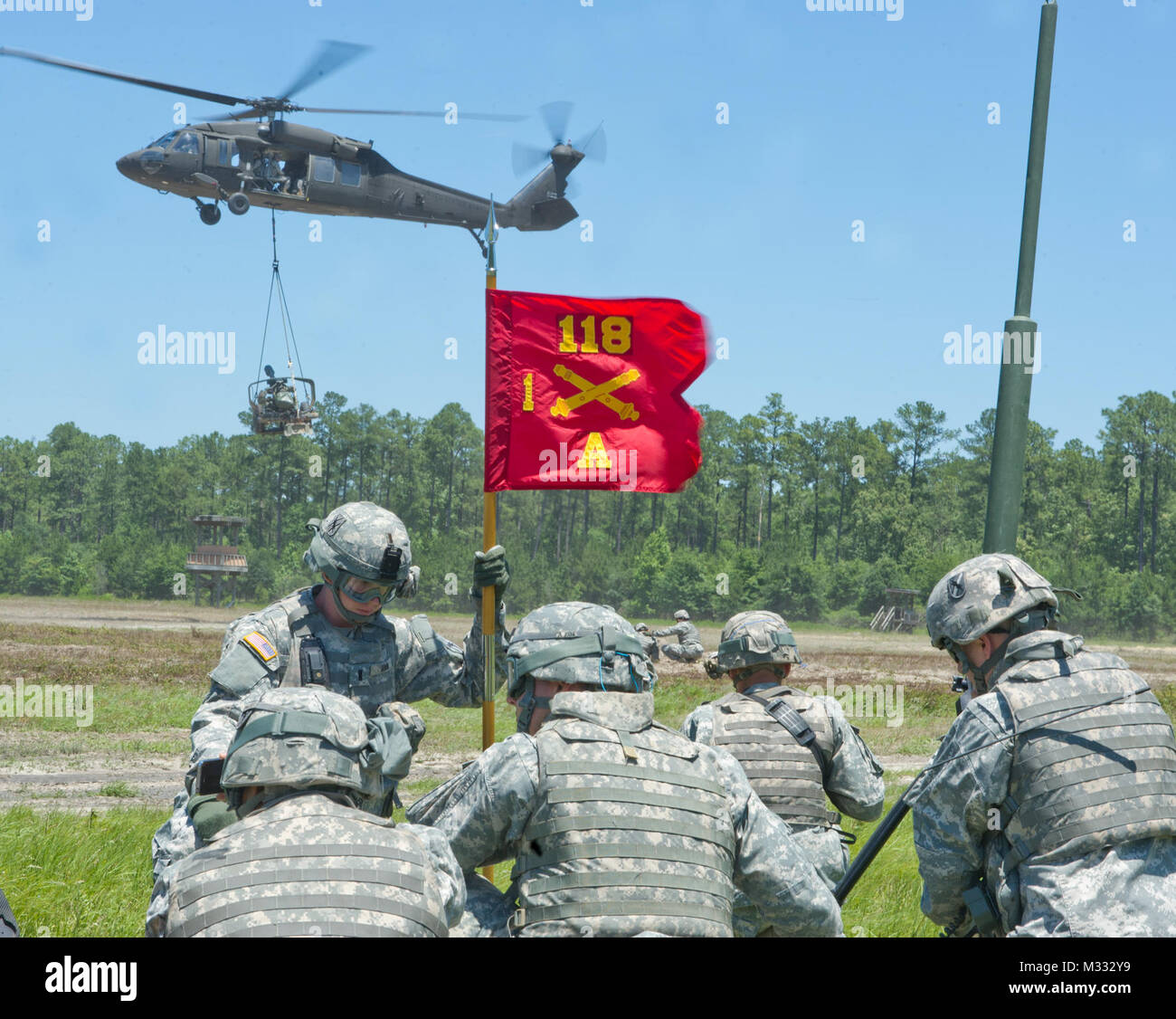History is booming for the Georgia Army National Guard, literally! The Savannah-based "Hickory’s Howitzers" 1st Battalion, 118th Field Artillery Regiment and the 1st Battalion, 185th Aviation Regiment teamed to conduct the first air mobile raid in Georgia Guard history at Fort Stewart. With the "Way Forward" being a ready, expedient and mobile force element, the "drop and pop" maneuvers were an integral part of the 118th Field Artillery’s annual training. Joining with aviation elements made the training experience a little less mundane. “It’s very exciting training,” Spc. Joshua Holz, a Sava Stock Photo