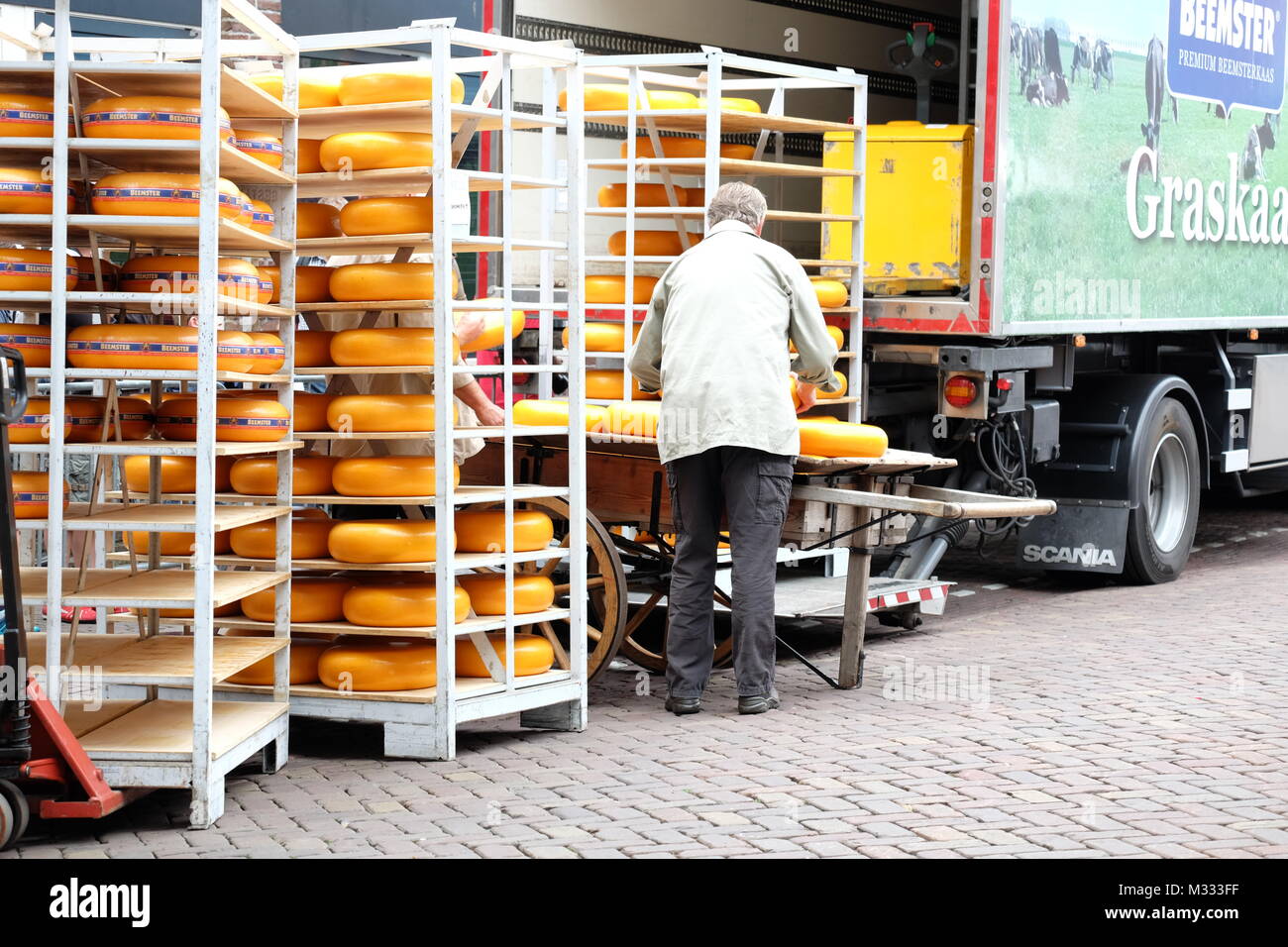 Racks of Cheese Wheels at the Alkmaar Cheese Market Stock Photo