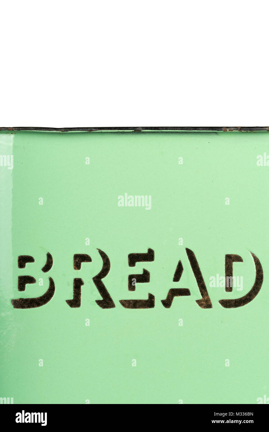 Wording on the side of a vintage 1930s green enamel bread bin