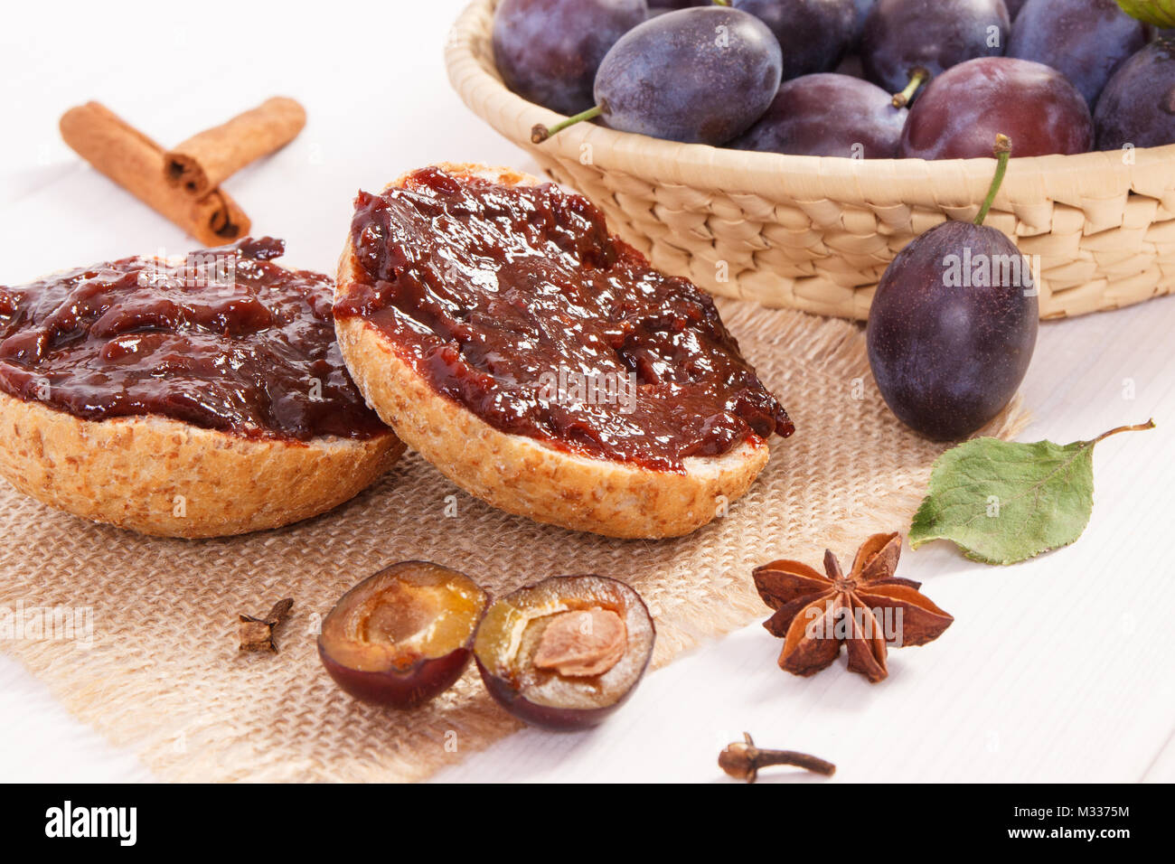 Fresh prepared sandwiches with plum marmalade or jam, concept of delicious breakfast Stock Photo