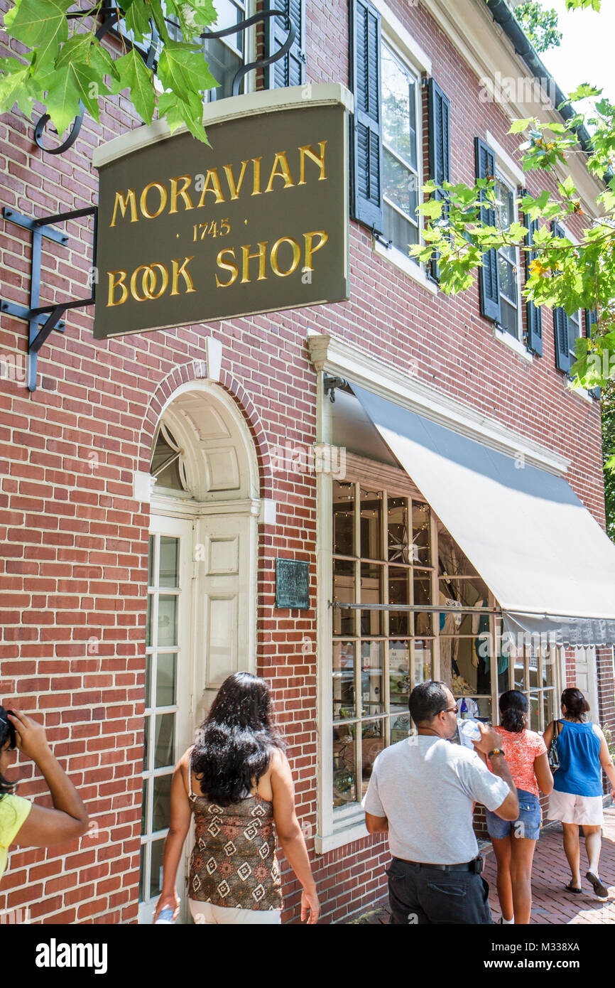 Bethlehem Pennsylvania,Main Street,historic district,Colonial America building,1745,sign,Moravian Book Shop,store,stores,businesses,district,Asian. ma Stock Photo